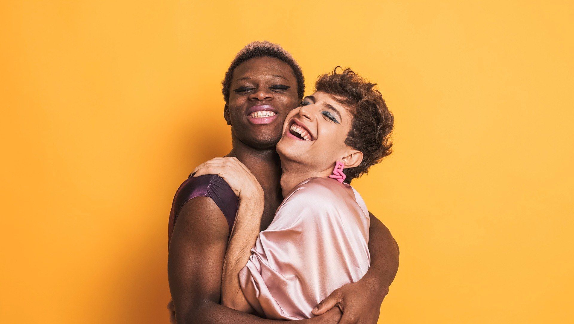 Stylish LGBTQIA+ couple wearing make-up and fashionable clothes - Cashrewards.jpg